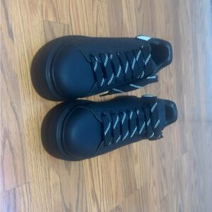 Stylish Black Sneakers with White Accents